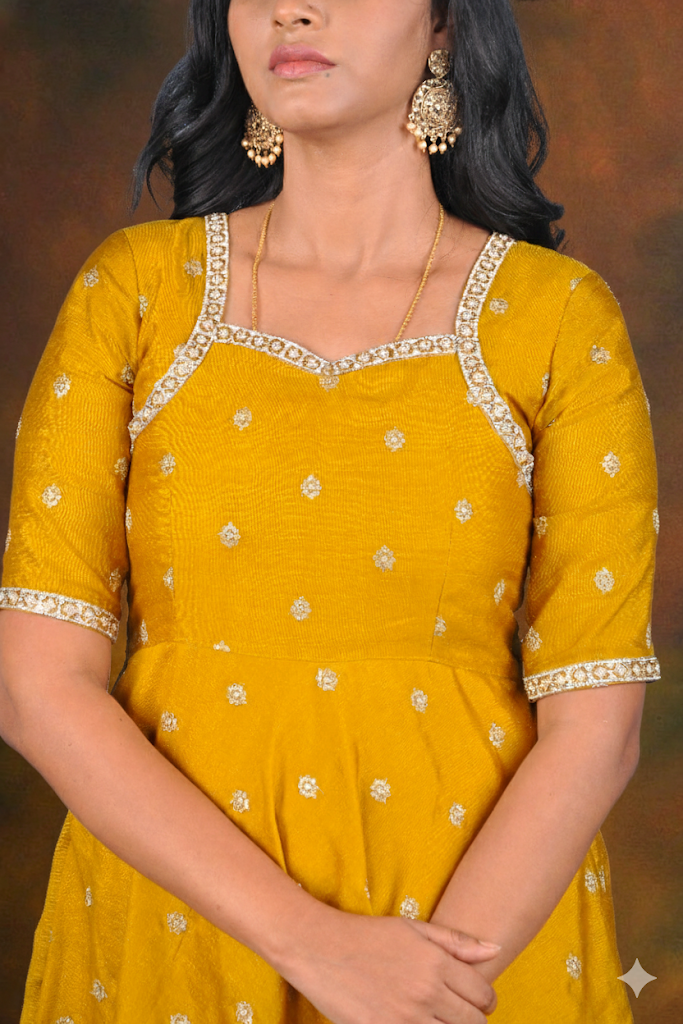 Elegance in Gold: Vichitra Silk Anarkali Gown